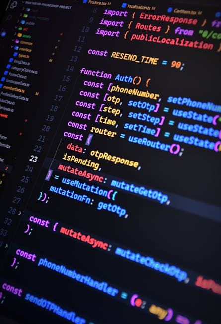A close-up photograph of computer programming code displayed on a screen, with colorful syntax highlighting in shades of purple, pink, blue, yellow, and orange. The code includes functions, variables,